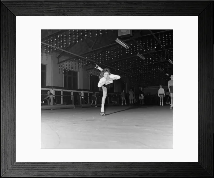 Framed Print : Teenager Betty Jones pictured roller skating at the rink in Birch Park
