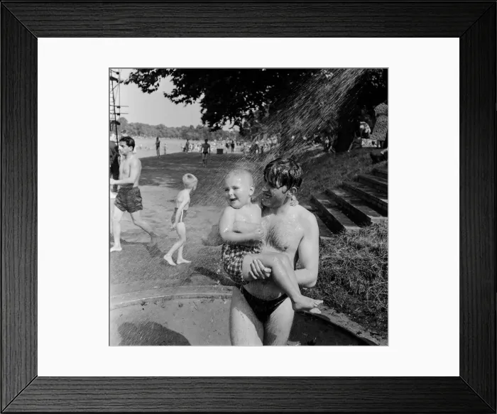 Framed Print : Londons Hyde Park Lido. A father and young son at the Serpentine Framed Print : Londons Hyde Park Lido. A father and young son at the Serpentine
