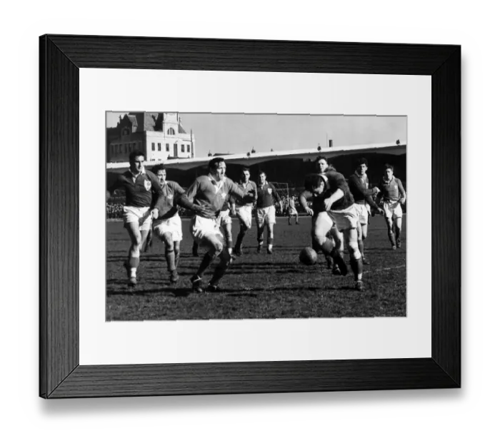 Framed Print : Sport - Rugby - Wales v France - Bienes, the French forward kicks for touch as Welsh