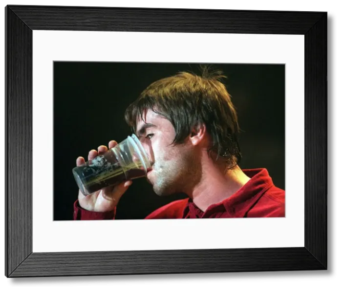 Framed Print : Liam Gallagher Oasis pop group December 1997 Drining beer from glass SECC Glasgow