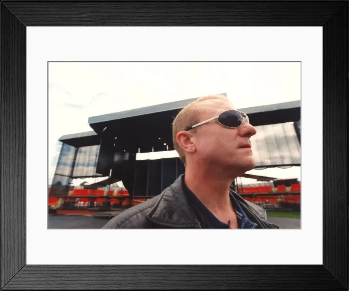 Framed Print : Singer songwriter John Miles, surveys the scene the day before playing the Gateshead