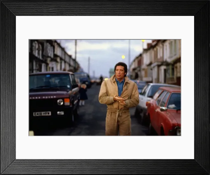 Framed Print : Tom Jones walking through Pontypridd December 1987