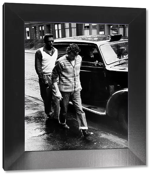 Gene Vincent pop singer 1960 beside taxi arriving back at hotel after being rushed to