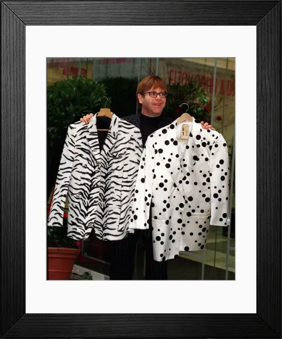 Framed Print : Elton John with his old clothes November 1997 he is selling clothes