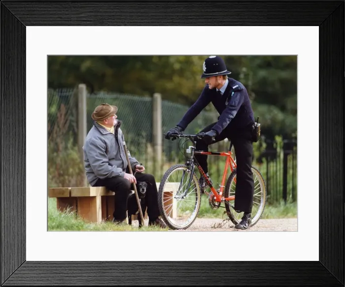 Framed Print : P. C. Stuart Martin on a bicycle patrol in Coventry, stops to chat to Bob Leighton Framed Print : P. C. Stuart Martin on a bicycle patrol in Coventry, stops to chat to Bob Leighton