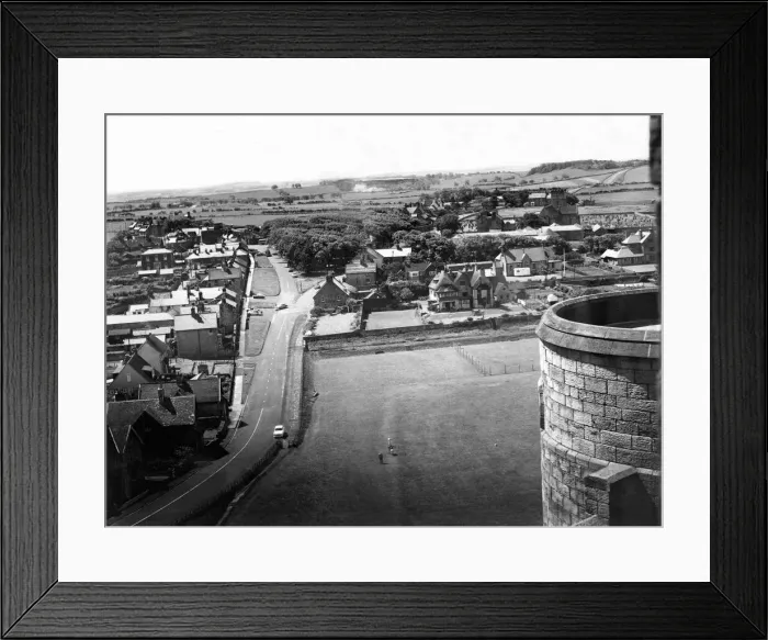 Framed Print : A panoramic view of Bamburgh Village from the top of Bamburgh Castle 13 June 1960 Framed Print : A panoramic view of Bamburgh Village from the top of Bamburgh Castle 13 June 1960
