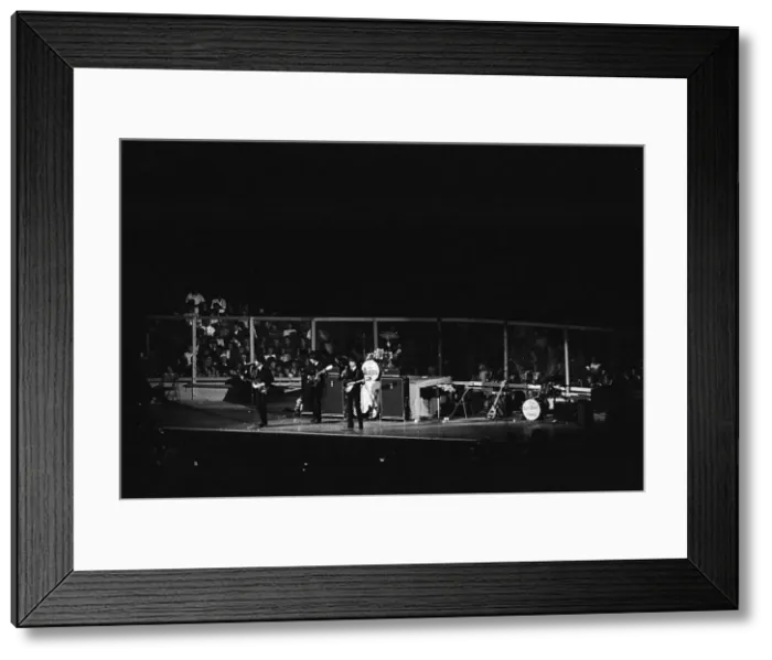 Framed Print : British pop group The Beatles performing on stage at the Cow Palace in San Francisco