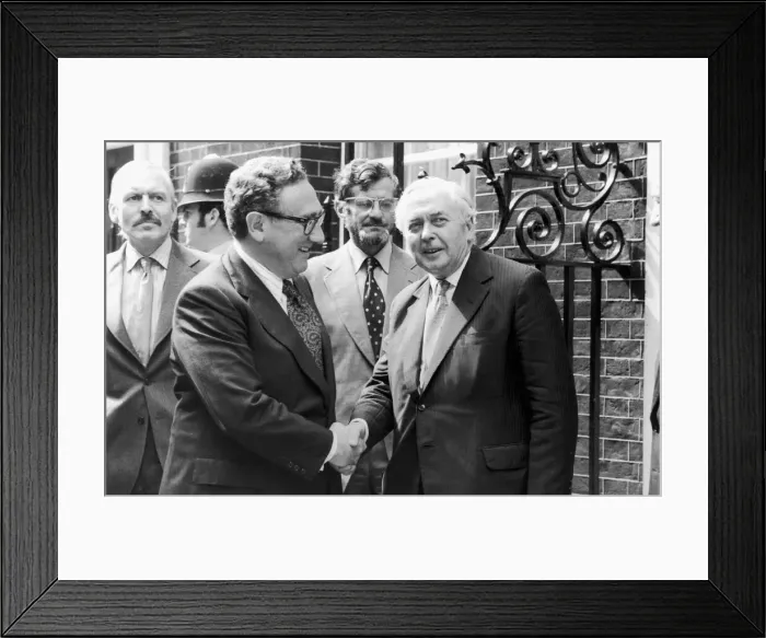 Framed Print : American peace maker Dr Henry Kissinger (left) seen here after flying into London Framed Print : American peace maker Dr Henry Kissinger (left) seen here after flying into London