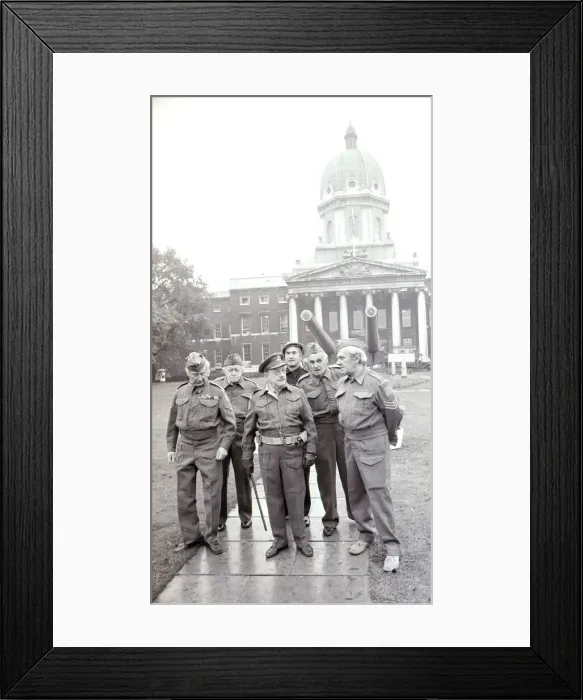 Framed Print : Cast of TV programme Dads Army in costume for the opening of the Imperial War Museam