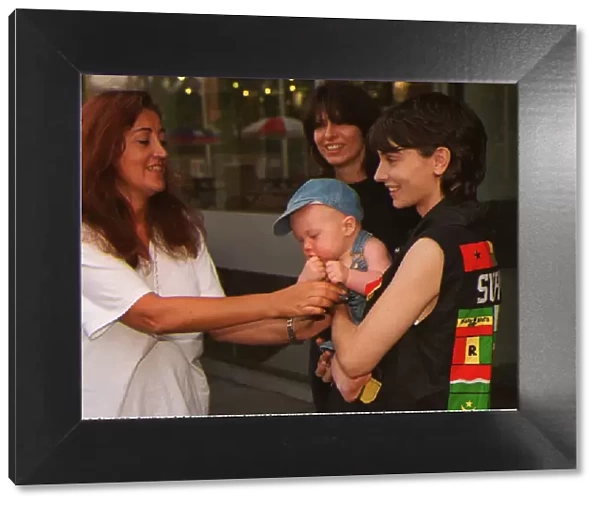 Sinead O Connor and Chrissie Hynde with baby Otis and Lynn E Franks who are
