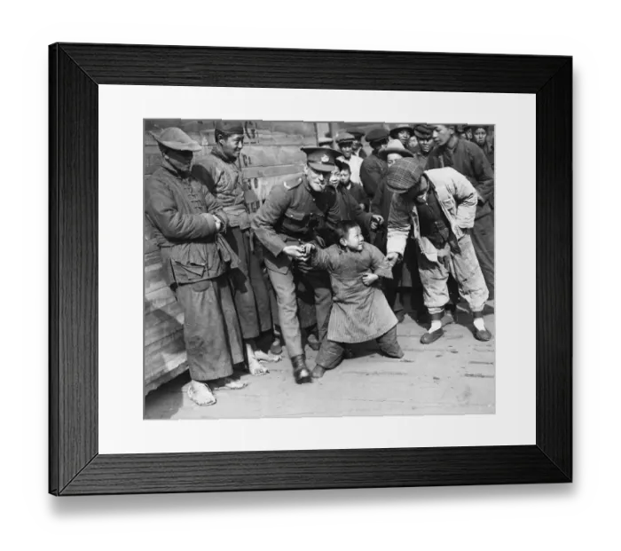 Framed Print : Shanghai March 1927 A young chinese boy is not sure that he wants to play with Framed Print : Shanghai March 1927 A young chinese boy is not sure that he wants to play with