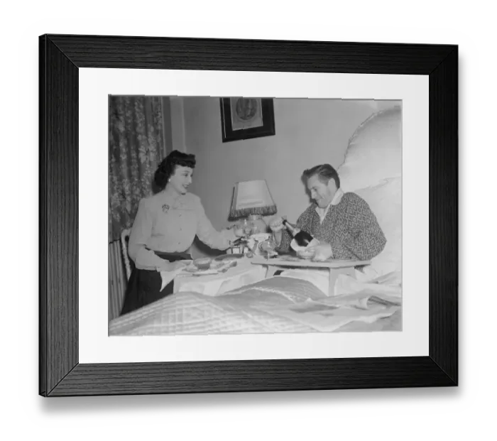 Framed Print : Film stars celebrate 1st Wedding Anniversary. 1949 John McCallum in bed with
