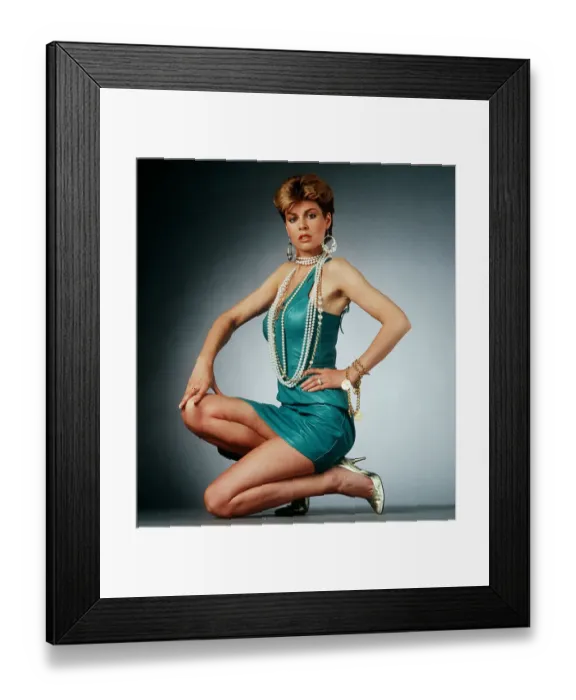 Framed Print : 1980s Dress and Fashion Model wearing turquise leather dress 1986