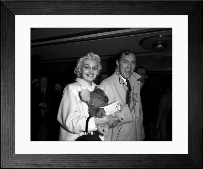 Framed Print : Bill Haley with his wife leave London airport on their way back to America after a tour Framed Print : Bill Haley with his wife leave London airport on their way back to America after a tour