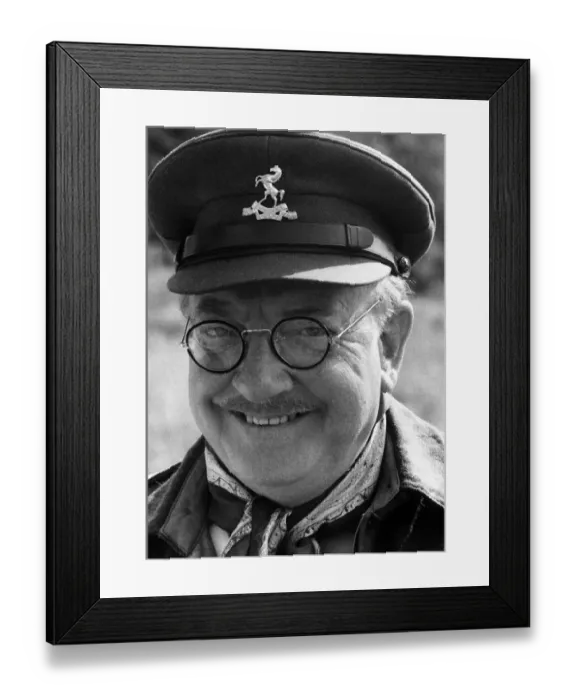 Framed Print : Arthur Lowe who plays Captain Mannering in the BBC Series Dads Army seen here in between