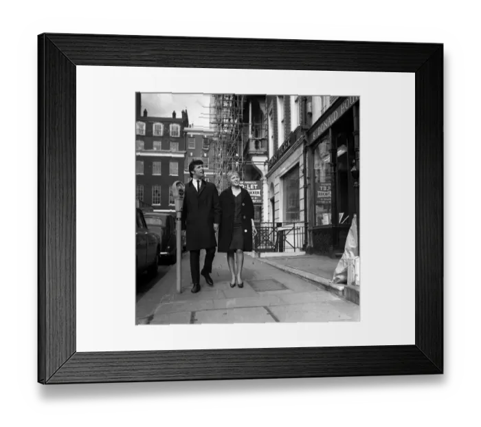 Framed Print : Tom Jones pop star and his wife Lyn Jones in London March 1965 do some house