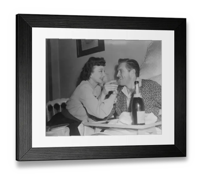 Framed Print : Film stars celebrate 1st Wedding Anniversary. 1949 John McCallum in bed with