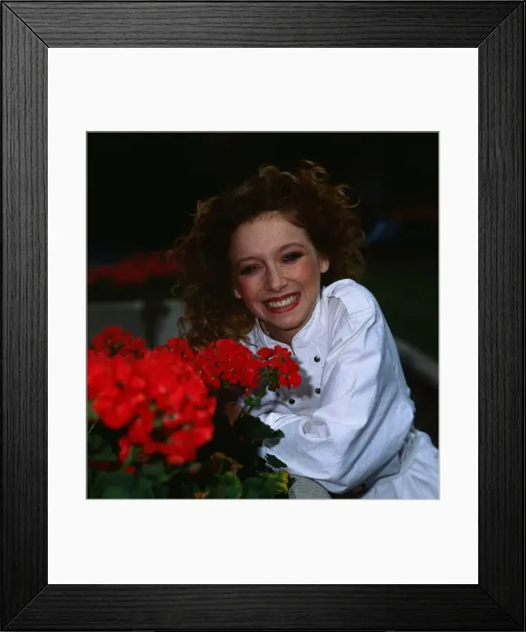 Framed Print : Lena Zavaroni wearing white blouse June 1987