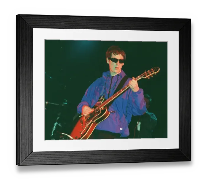Framed Print : Guitarist with pop group Nowaysis Oasis tribute band at T in the Park on stage in NME