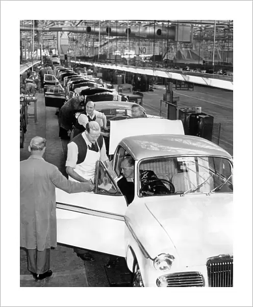 Men at work on the Rapier track at the Rootes Group factory at Ryton, Coventry