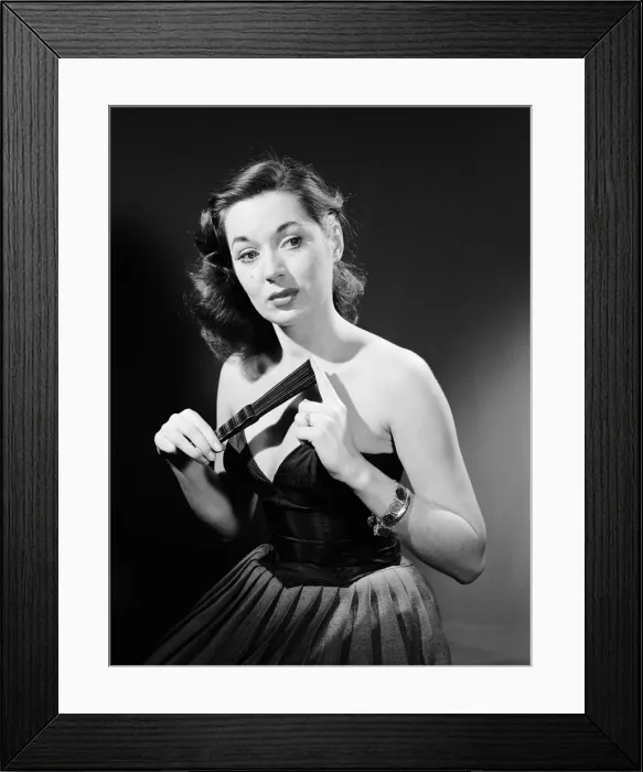 Framed Print : Model with fan in strapless dress. Model with fan in strapless dress. Circa 1964 Framed Print : Model with fan in strapless dress. Model with fan in strapless dress. Circa 1964