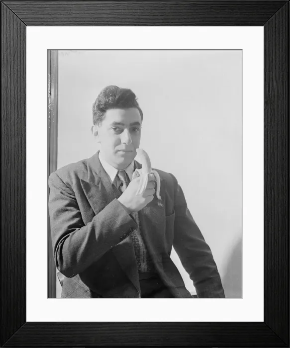 Framed Print : Man eating a banana. 27th April 1953 to illustrate the easing of rationing Framed Print : Man eating a banana. 27th April 1953 to illustrate the easing of rationing