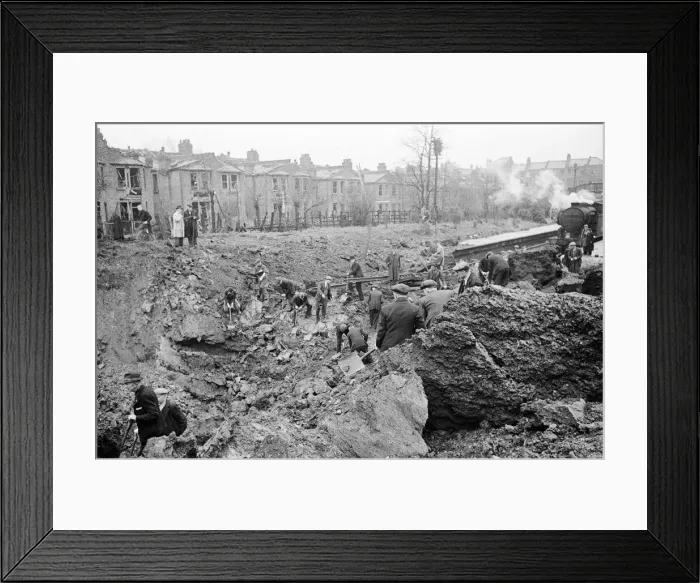 Framed Print : V2 Rocket incident near Palmers Green Station. Crater made by the rocket after Framed Print : V2 Rocket incident near Palmers Green Station. Crater made by the rocket after