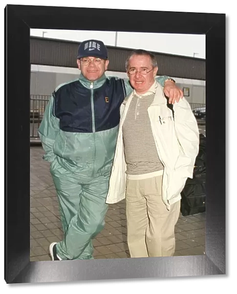 Sir Elton John leaving Heathrow on his way March 1998 to Australia with manager