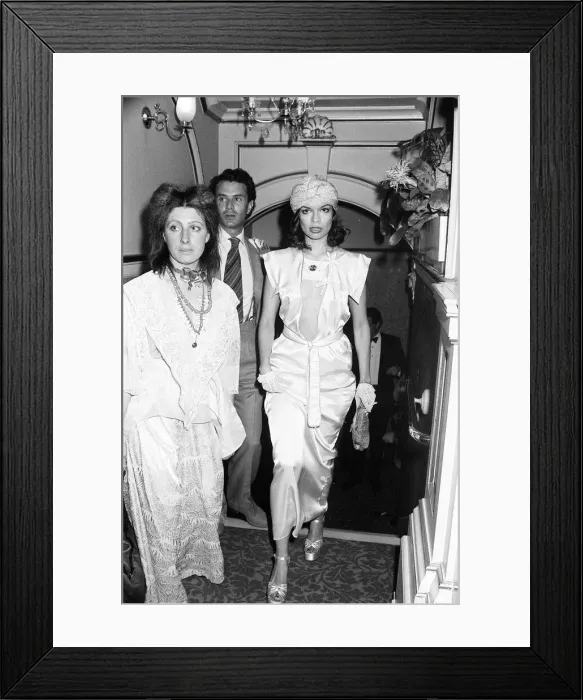 Framed Print : Rolling Stones. Bianca Jagger wife of Mick Jagger in revealing open front dress in March