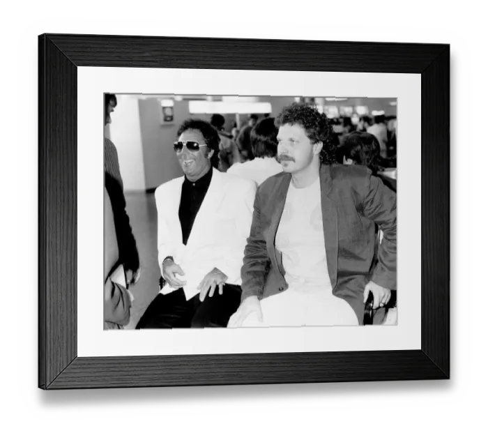 Framed Print : Tom Jones the singer at Heathrow airport with son