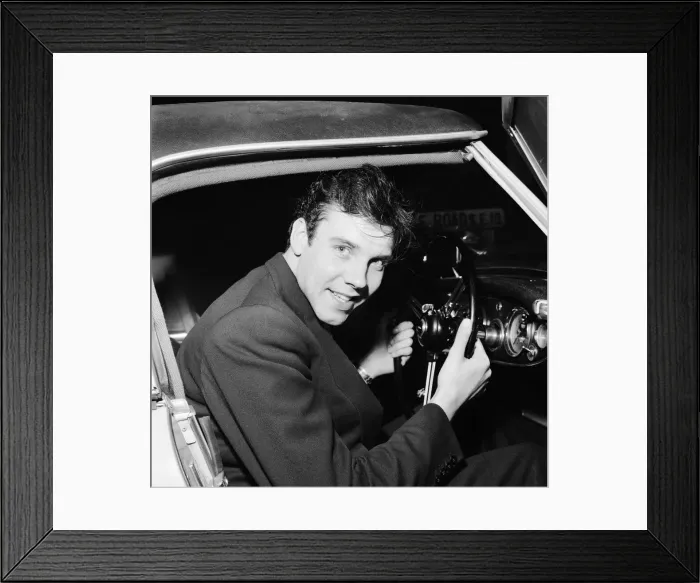 Framed Print : Marty Wilde singer, pictured sitting at wheel of motorcar, 12th February 1959 Framed Print : Marty Wilde singer, pictured sitting at wheel of motorcar, 12th February 1959