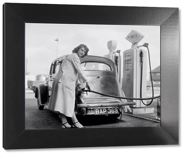 Ivy Dean petrol pump attendant. 28th June 1952