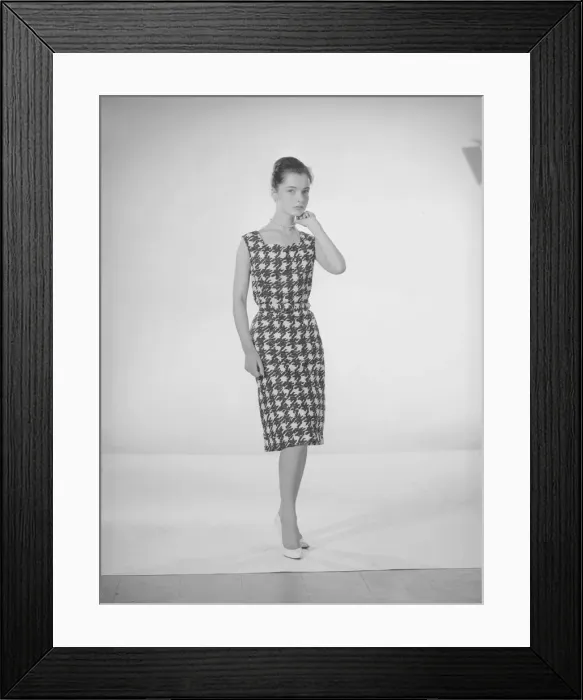 Framed Print : Model Jennifer Goddard. Young woman in houndstooth dress Framed Print : Model Jennifer Goddard. Young woman in houndstooth dress