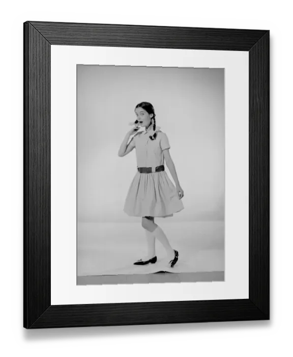 Framed Print : Model Jennifer Goddard. Brown-haired girl in checkered dress with pig tails Framed Print : Model Jennifer Goddard. Brown-haired girl in checkered dress with pig tails