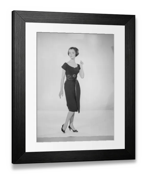 Framed Print : Model Jennifer Goddard. Young woman in short dressy black dress Framed Print : Model Jennifer Goddard. Young woman in short dressy black dress