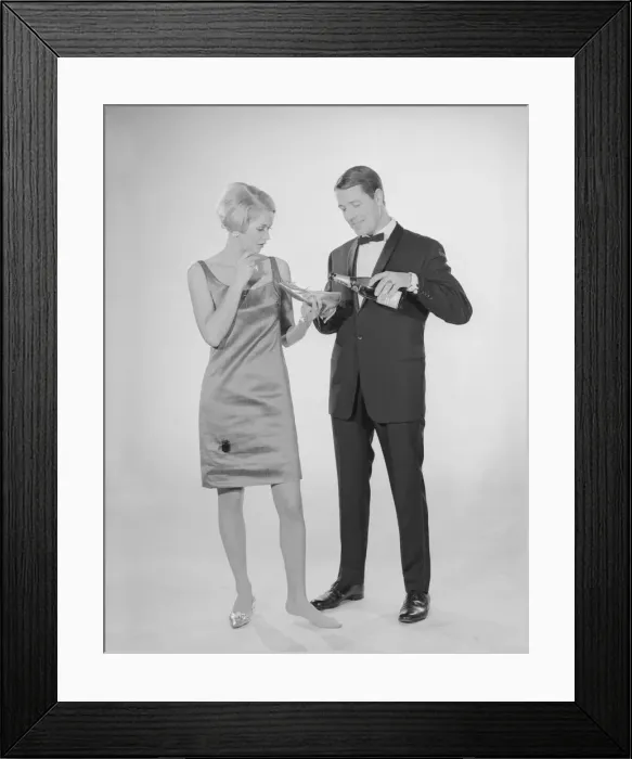 Framed Print : Reveille Studio Champagne from a slipper. Models pat Hinwood and Ray Curtis. Circa 1960 Framed Print : Reveille Studio Champagne from a slipper. Models pat Hinwood and Ray Curtis. Circa 1960