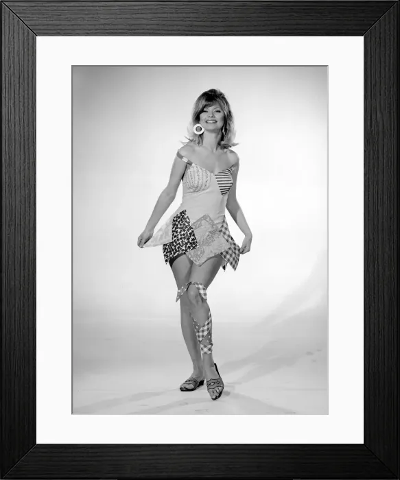 Framed Print : Reveille Beachwear Fashion Feature Woman modelling a patchwork one piece swimming Framed Print : Reveille Beachwear Fashion Feature Woman modelling a patchwork one piece swimming