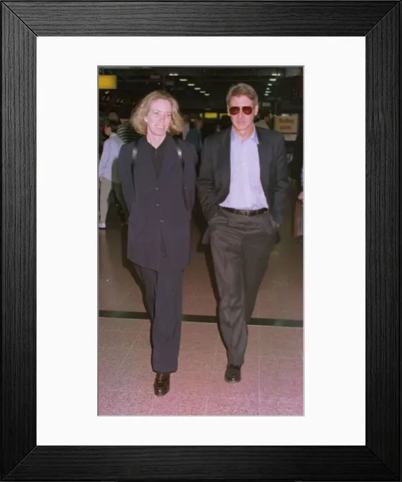 Framed Print : Harrison Ford and his wife Melissa Matheson leave Heathrow for New York on Concorde ***