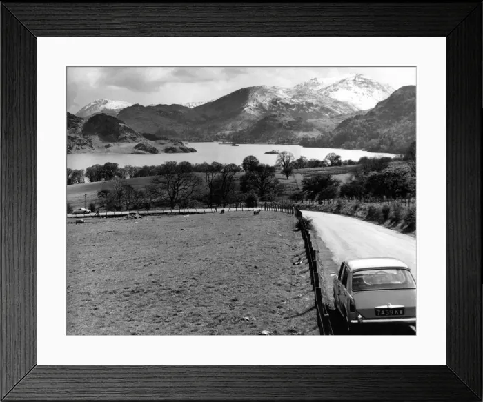 Framed Print : Lake District - A car travels along at Ullswater looking towards Patterdale 1 May 1967