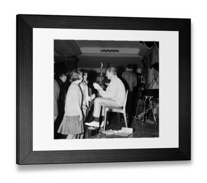 Framed Print : Fans welcome the return of pop singer Johnny Leyton at a fan club concert at the Empire