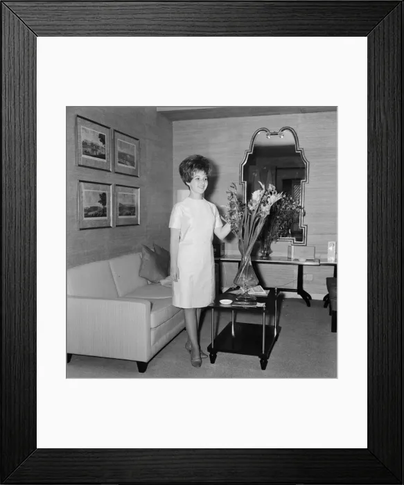Framed Print : American pop singer Brenda Lee in her room at the Hilton Hotel in London