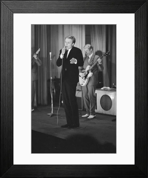 Framed Print : British pop singer Mike Sarne performing on stage with his band Framed Print : British pop singer Mike Sarne performing on stage with his band