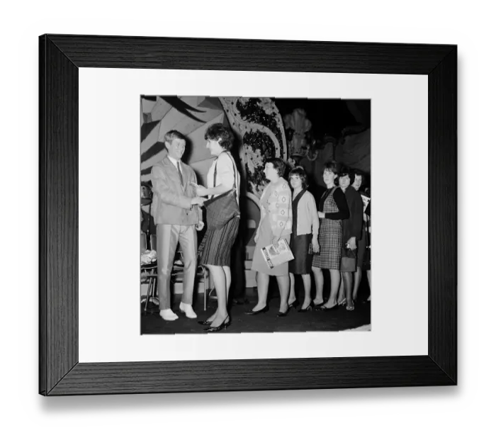 Framed Print : Singer Johnny Leyton greeted by a long line of teenage girls hopeful for autographs after