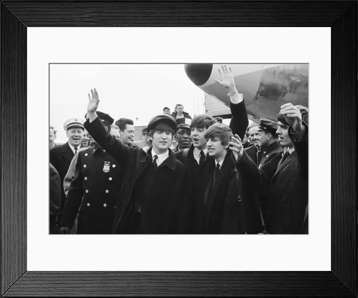 Framed Print : British pop group The Beatles wave to fans on their arrival in New York for the band Framed Print : British pop group The Beatles wave to fans on their arrival in New York for the band