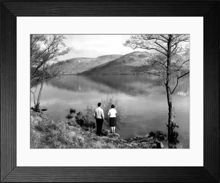 Framed Print : Lake District - A couple stand at the waters edge at Ullswater 19 March 1963 Framed Print : Lake District - A couple stand at the waters edge at Ullswater 19 March 1963
