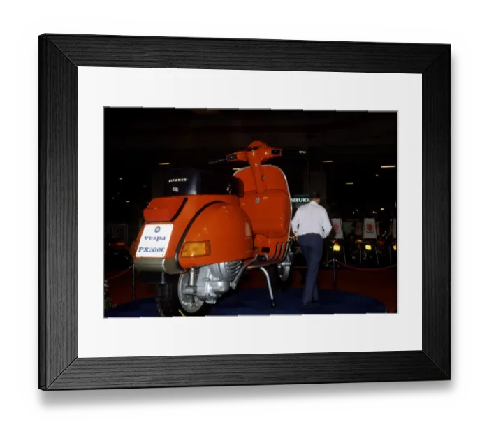 Framed Print : A Vespa Scooter at the 1983 Earls Court Motorcycle Show. 19th August 1983