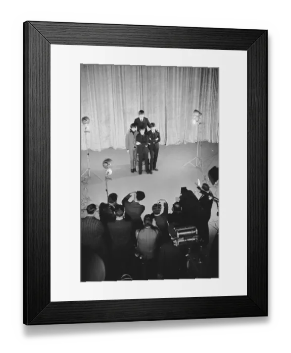 Framed Print : British pop group The Beatles pose for photographers at a CBS photocall in New York