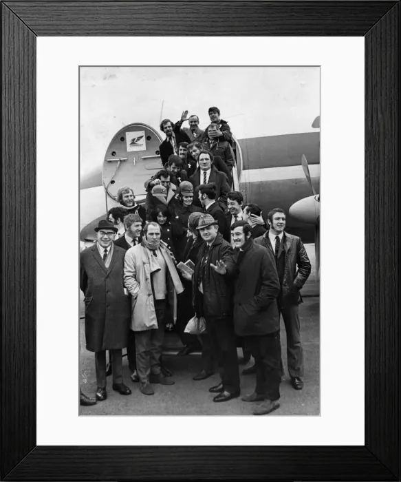 Framed Print : Murryfield here we come... The Wales team and officials board the aircraft at Rhoose