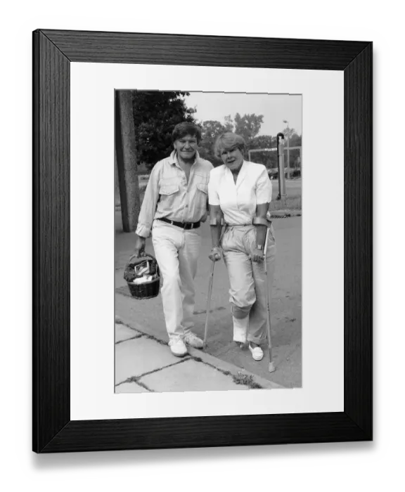 Framed Print : Dame Judi Dench Actress leaves hospital with her actor husband Michael Williams after