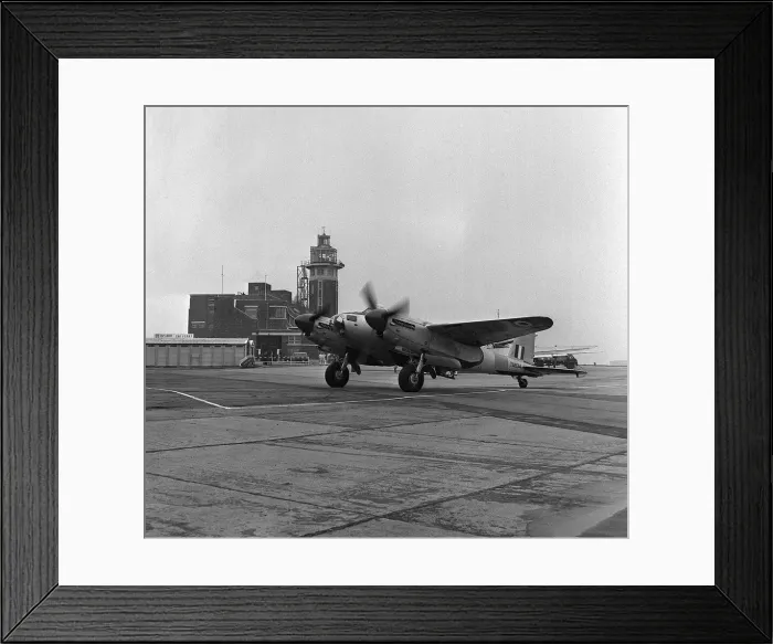 Framed Print : Aircraft De Havilland DH98 Mosquito TA634 arrives at Liverpool Airport flown by Flying